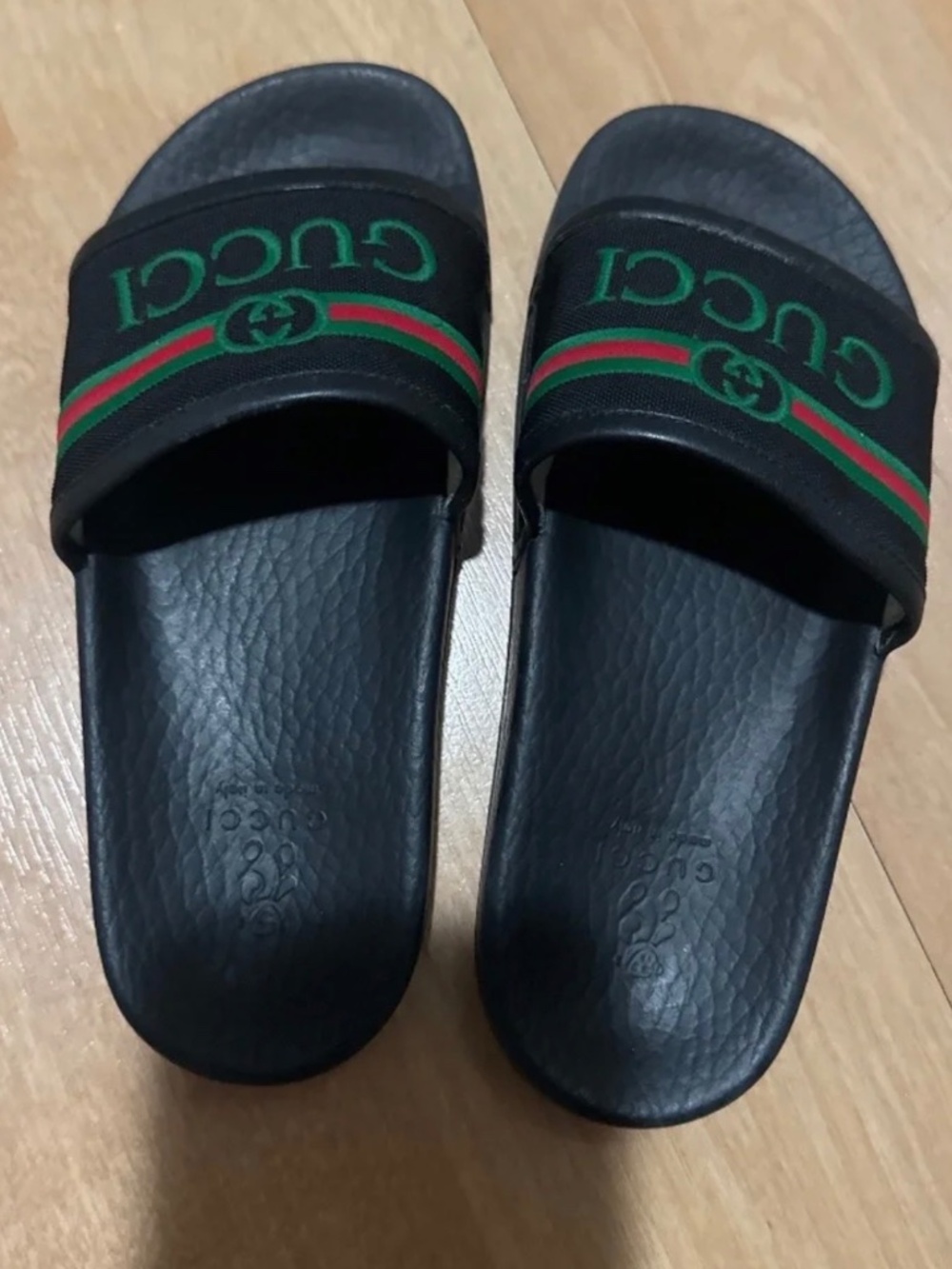 Gucci slides boy